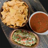 Guacamole, Salsa & Chips · Homemade crispy tortilla chips, chunky guacamole and salsa. For 10 guests.