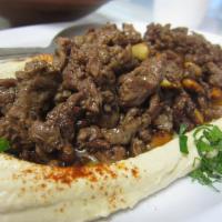 Hummus and Shawarma · Hummus topped with beef or chicken. Includes one side. 
