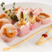 Pink Lady Roll · Shrimp tempura, spicy tuna and avocado inside wrap with soy bean paper.