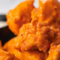 Boneless Wings · 1/2 lb.  of tender, boneless chicken wings, individually cut and hand-breaded right here, to...