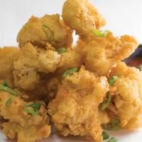 Battered Cauliflower · We don't do pre-made! Fresh cauliflower cut and hand-battered in our signature buttermilk ba...