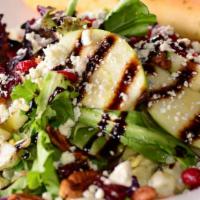Granny Smith Apple Pecan · Mixed greens tossed in maple vinaigrette and garnished with granny smith apples, dried cranb...