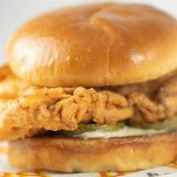 Brothers Classic Chicken Sandwich · Back to basics. Marinated chicken breast, hand-battered, fried with mayo and pickle on a toa...