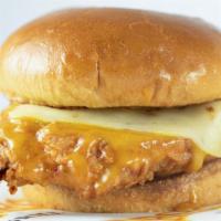 Nashville Gold Chicken Sandwich · Breaded and fried chicken breast covered in Brothers Nashville inspired golden BBQ sauce and...
