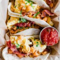 Breakfast Tacos · Eggs with choice of cheese, chorizo, potatoes, or bacon. Served all day.