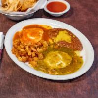 Huevos Divorciados Burritos Breakfast  · 2 open faced cheese enchiladas with two eggs, verde sauce, and salsa roja. Served all day.