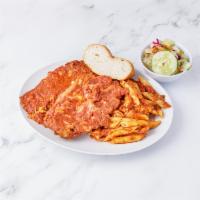 Joe's Famous  chicken Parmigiana · Freshly breaded tender chicken topped with mozzarella served with penne  