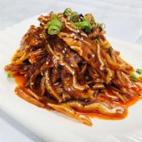 A4. Pig Ear with Chili Oil-红油耳片 · Medium spicy.