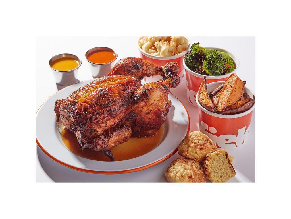 Whole Rotisserie Chicken With Sides · Our OG rotisserie chicken marinated with thyme, rosemary, and garlic. Quartered for sharing.  Served with FGC cornbread.