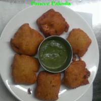 Paneer Pakora · Home made Indian semi-soft cubes of cheese dipped in chickpea batter and deep fried.