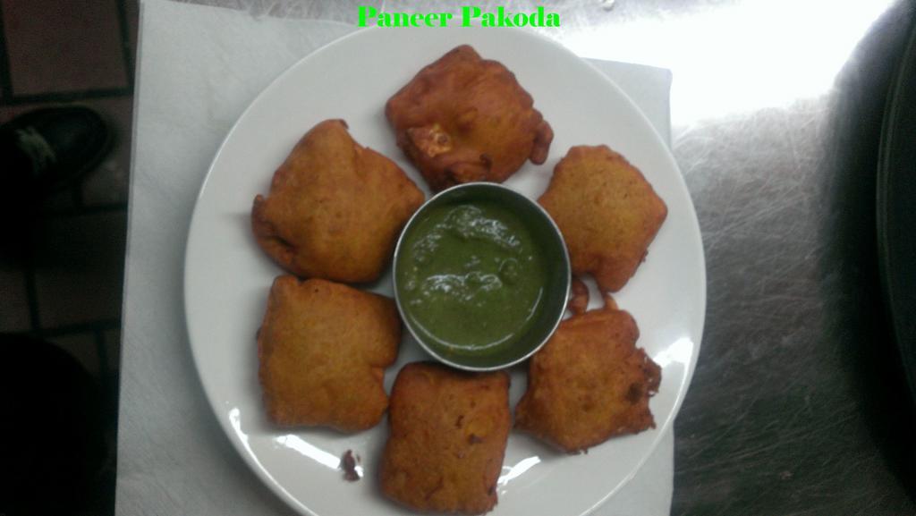 Paneer Pakora · Home made Indian semi-soft cubes of cheese dipped in chickpea batter and deep fried.