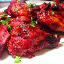Tandoori Chicken · Tandoori chicken is the best known Indian delicacy, bone in chicken marinated with special spices and grilled in clay oven.