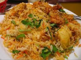 Chicken Biryani · Long grained basmati rice and curried chicken stew cooked in traditional way.