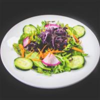 Simple Salad · Fresh greens, sprouts, choice of dressing (Vegan Caesar, honey mustard, peach vinegarette, c...