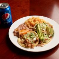 #2. Street Tacos Combo with rice & beans · 3 tacos choice of meat with onions, cilantro and lettuce.