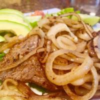 Bistec Encebollado · Grilled steak topped with cook onions.