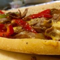 Philly Steak Sandwich  · with cheese, peppers, and onions Served with french fries. 