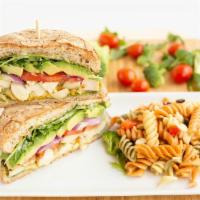 Chicken Fresca Sandwich · Oven roasted chicken, Artisan cheese blend, fresh sliced tomatoes, red onions, avocado, arug...