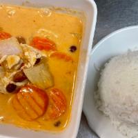 Massaman Curry · Potatoes, carrots, onions, and peanuts in massaman curry sauce. curry entrees are cooked to ...