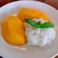 Mango Sticky Rice · Fresh mango with sweetened sticky rice. Sticky rice made with coconut milk, sugar, and salt