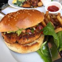 salmon burger · Pico de gallo, avocado , tartar sauce , French fries , mixed salad