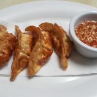 3. Pot Stickers · 5 pieces. Served with sweet and sour sauce.