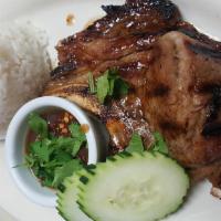 29. BBQ Pork Chop Rice · Served with tamarind sauce.