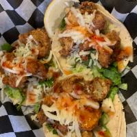 Sweet Thai Cauliflower Taco · 3 tacos. Choice of either fried or sauteed cauliflower, lettuce, Jack cheese and  Thai chili...