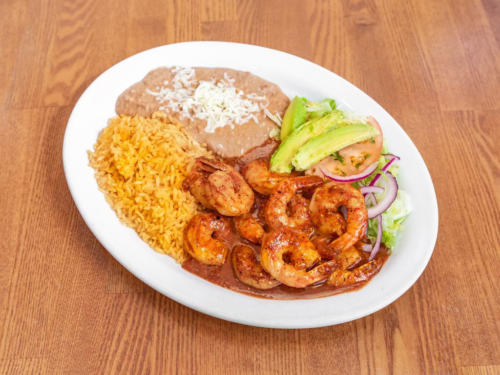 Camarones Rancheros · Shrimp in tomato sauce and bell peppers.