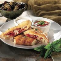 Pepperoni Bread · Hearth-baked dough stuffed with 3 cheeses and pepperoni,
served with 2 dipping sauces.