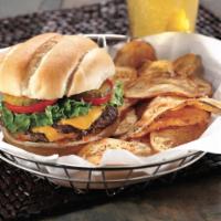 Bistro Burger · Double meat, American cheese, lettuce, tomatoes, pickles and special sauce. Served with side.
