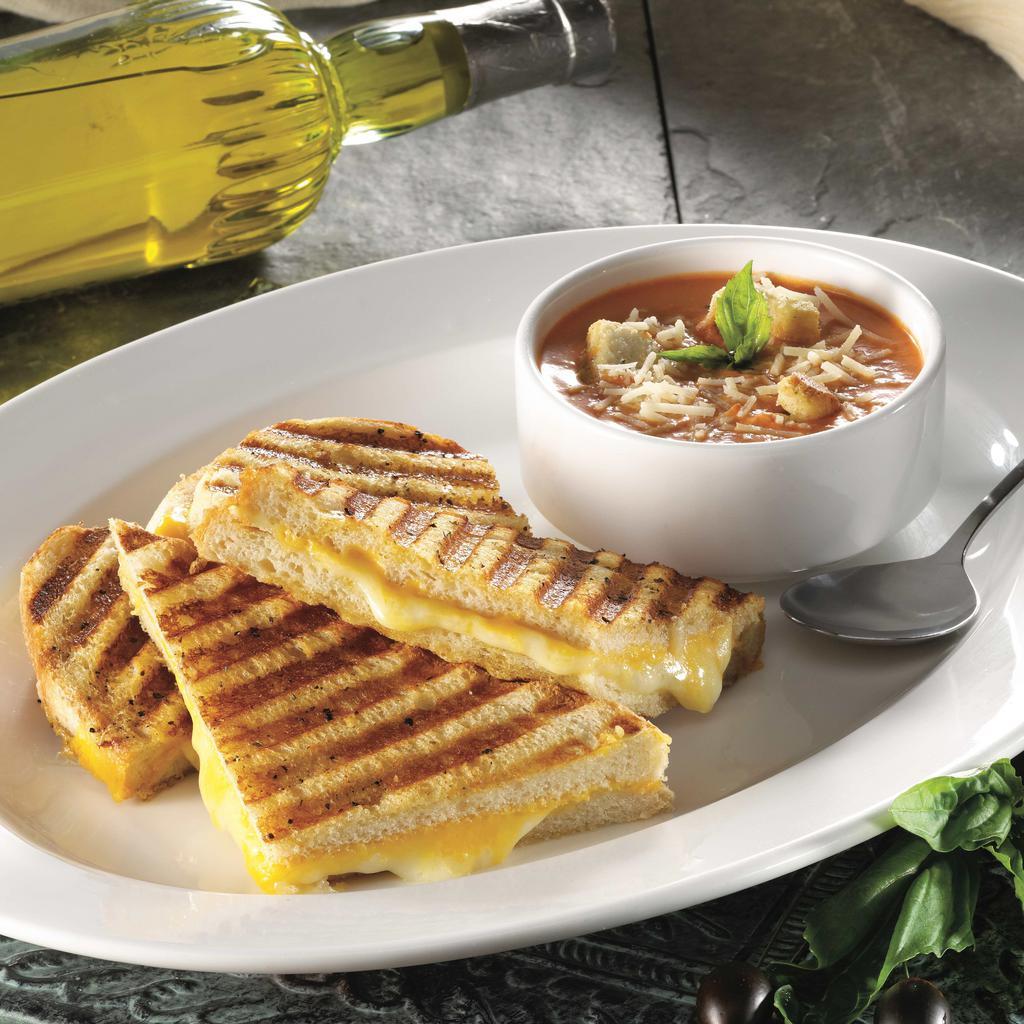 4-Cheese Grilled Cheese · A classic grilled cheese sandwich made with 4 cheeses. Served with side.