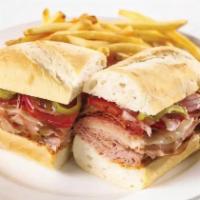 Italian Sub · A classic Italian Sub with salami, ham and crispy pepperoni, provolone, tomato, red onions, ...