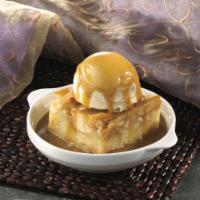 Dulce De Leche Bread Pudding · Moist, House-Made Bread Pudding Served Warm with a Scoop of premium Vanilla Ice Cream and Ri...