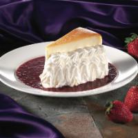 Cheesecake with Strawberry-Amaretto Coulis · Decadent Traditional Cheesecake Made even Better with an Amaretto-Enhanced Strawberry Sauce ...