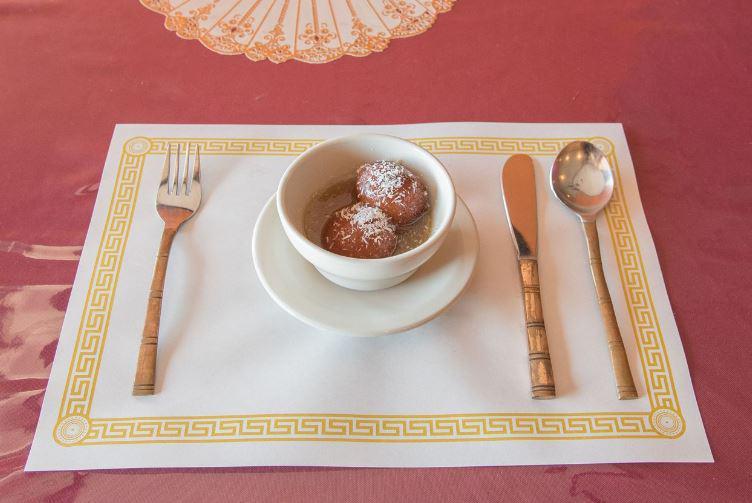 Gulab Jamun  · Light cheese morsels dipped in cinnamon flavored syrup.