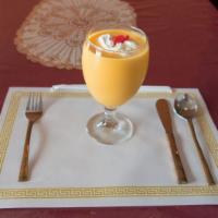 Mango Lassi  · A refreshing yogurt drink churned with mangoes. 