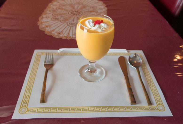 Mango Lassi  · A refreshing yogurt drink churned with mangoes. 