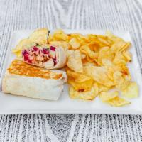 Mediterranean Wrap · Cajun grilled chicken, hummus, feta cheese, cucumbers, and beets, served in a warm tortilla....