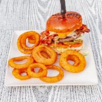 Tavern Burger · 1/2 lb. Angus beef topped with grilled onions, mushrooms, bacon, cheddar, and Swiss cheese.
