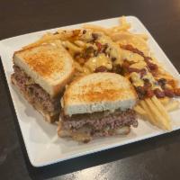 Patty Melt · 1/2 lb. Angus beef topped with grilled onions and Swiss cheese on grilled rye bread.
