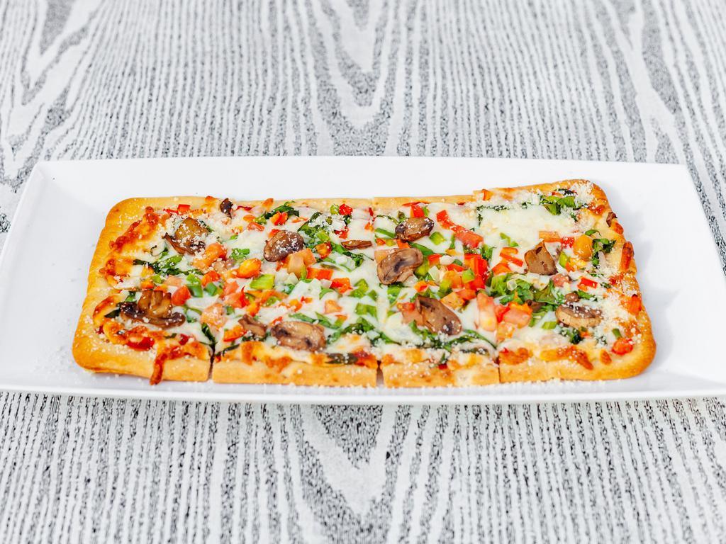 Veggie Flatbread · Onion, spinach, tomatoes, green peppers, roasted red peppers, mushrooms, and mozzarella.