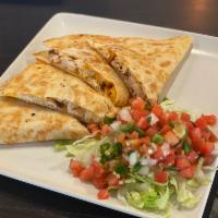 Quesadilla · Flour tortilla with chicken, a blend of cheddar and mozzarella cheese, served with salsa and...