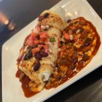 Wet Burrito · Hearty stuffed flour tortilla with your choice of beef or chicken, rice, cheddar, and pico d...
