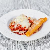 Chicken Parmesan · Breaded chicken breast topped with our homemade meat sauce and mozzarella cheese. Served wit...