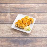 Lion King Roll · Inside : Crab meet and avocado 
On top : Baked salmon and sauce