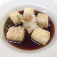 Age-Dashi Tofu  · Fried tofu, green onion, ginger, daikon, topped with a tempura sauce.