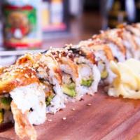 Eel Lover Roll  · Shrimp tempura, avocado, cucumber, topped with BBQ eel, teriyaki sauce and sesame seeds.