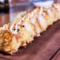 45th St. Roll · Tempura style roll, salmon, avocado, cream cheese topped with sweet aioli and soy glaze sauce.