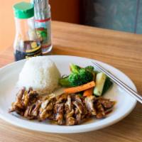 Chicken Teriyaki  · House marinated grilled chicken, steamed vegetables, rice and topped with teriyaki sauce.